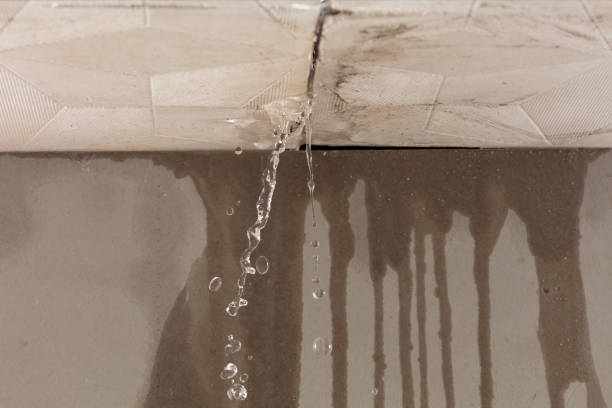 Professional Flood Damage Cleanup technician working in Cumberland, KY